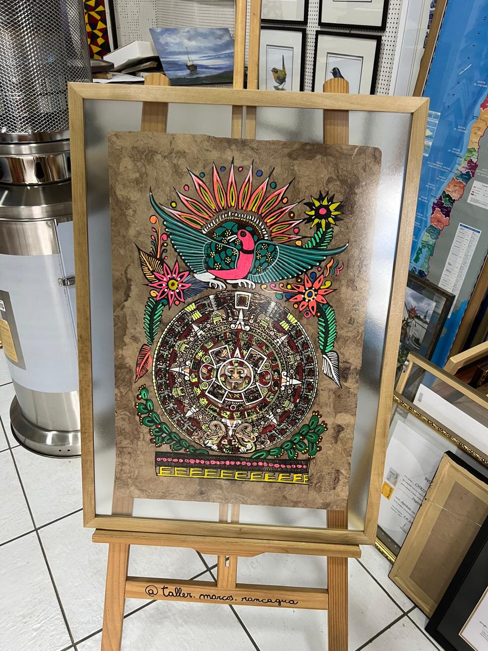 Arte azteca colibrí y calendario solar sobre papel amate enmarcado