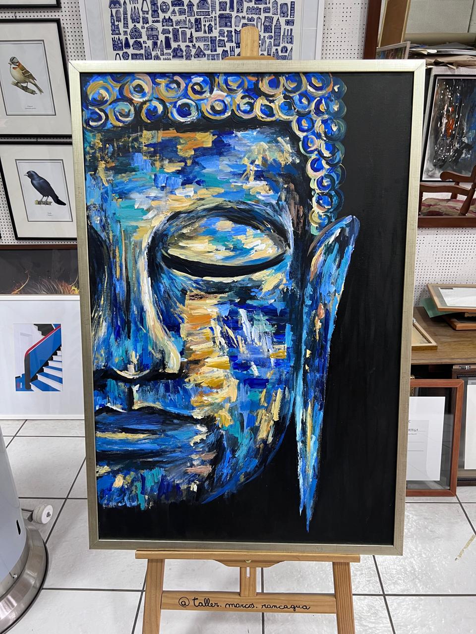 Óleo rostro de Buda en tonos azules y dorados a espátula enmarcado en marco plateado